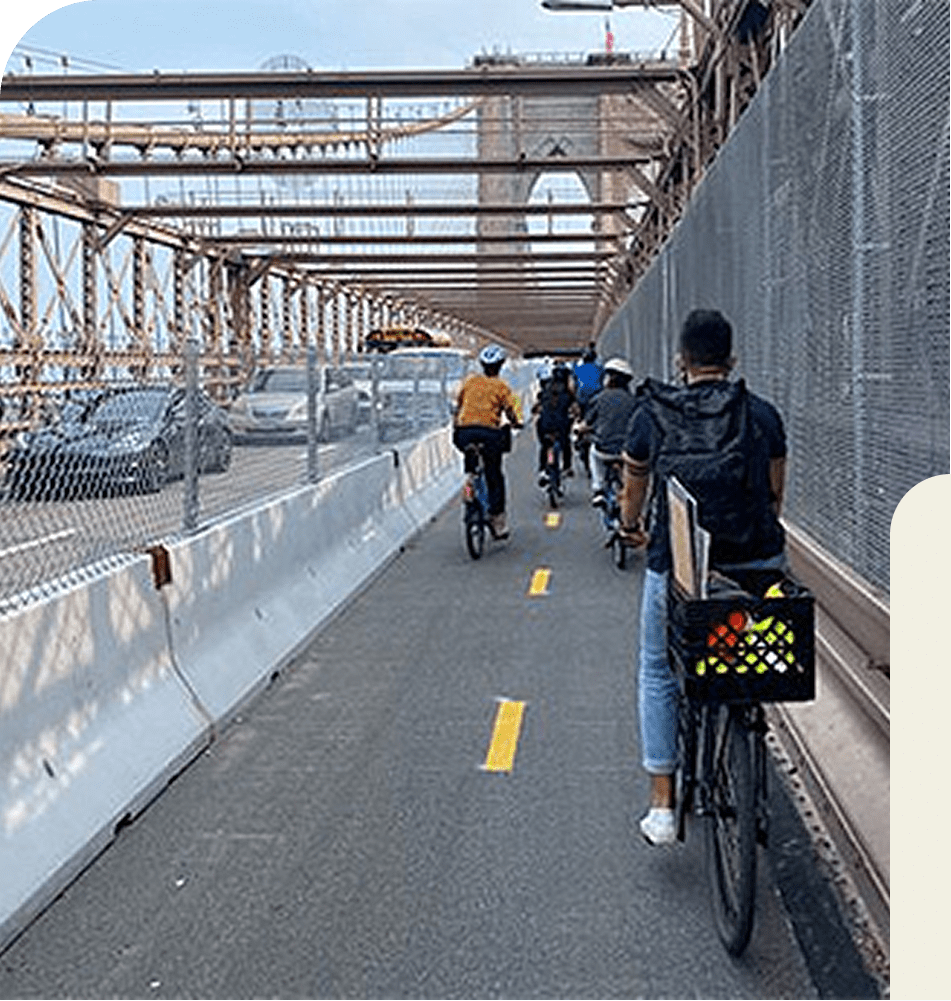 Roman Stone | Brooklyn Bridge Bike Lane Image