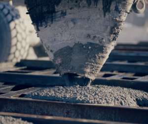 Concrete being poured during the precast manufacturing process for engineered infrastructure products