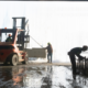 Roman Stone team manufacturing and handling engineered precast concrete components