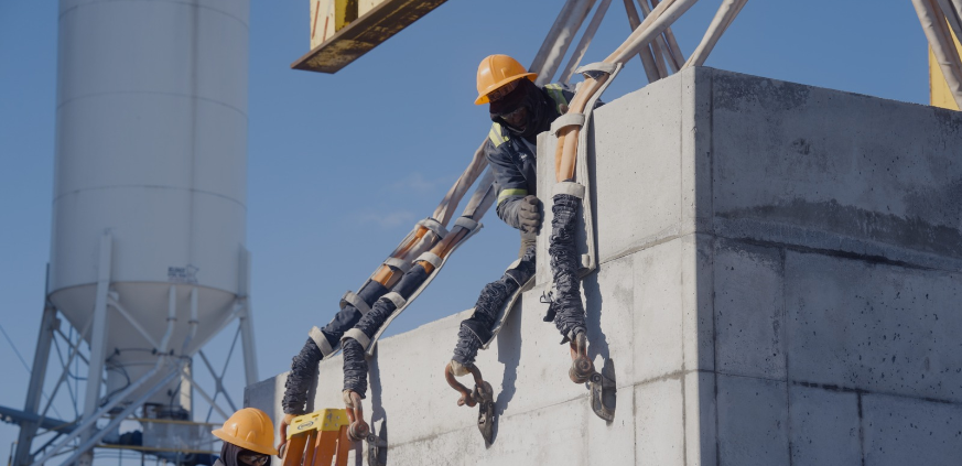 Roman Stone employee working on a precast concrete structure during the manufacturing process.